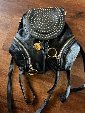 See By Chloe Black Leather Black/gold Convertible Handbag Mini Backpack Purse